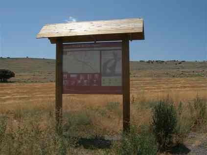 Panneau d'information avec carte à la gare de Santa Eulalia